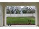 Private backyard with a grassy area and wooden fence at 16732 Mooner Plank Cir, Wimauma, FL 33598