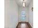 Bright and airy entryway with hardwood floors at 16732 Mooner Plank Cir, Wimauma, FL 33598