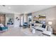 Spacious living room with large artwork and comfortable seating at 18134 Cropside Trl, Lakewood Ranch, FL 34211