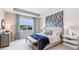 Spacious main bedroom with a large bed and stylish decor at 18134 Cropside Trl, Lakewood Ranch, FL 34211