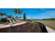 Relaxing seating area with lush landscaping and scenic views at 18137 Cropside Trl, Lakewood Ranch, FL 34211