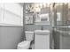 Clean bathroom with toilet, sink, shower, and modern fixtures at 206 N Himes Ave, Tampa, FL 33609
