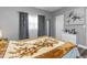 Bedroom with a double bed and window with curtains at 206 N Himes Ave, Tampa, FL 33609