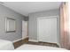 Bedroom with two twin beds and a large closet at 206 N Himes Ave, Tampa, FL 33609