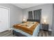 Bright bedroom with double bed, nightstands, and ample closet space at 206 N Himes Ave, Tampa, FL 33609