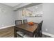 Dining area with four chairs and view of living room at 206 N Himes Ave, Tampa, FL 33609