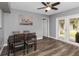 Dining area with four chairs and French doors to backyard at 206 N Himes Ave, Tampa, FL 33609