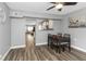 Dining area with table and chairs, open to living room at 206 N Himes Ave, Tampa, FL 33609