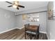 Dining area with four chairs and view of kitchen at 206 N Himes Ave, Tampa, FL 33609