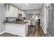Modern kitchen with white cabinets and granite countertops at 206 N Himes Ave, Tampa, FL 33609