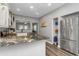 Modern kitchen with stainless steel appliances and granite countertops at 206 N Himes Ave, Tampa, FL 33609