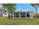 Covered patio with seating area and outdoor space at 206 N Himes Ave, Tampa, FL 33609