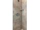 Shower stall with beige tile and built-in shelf at 206 N Himes Ave, Tampa, FL 33609