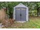Gray storage shed in backyard setting at 206 N Himes Ave, Tampa, FL 33609