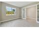 Bright and airy home office with neutral walls and tile floors at 2416 Wise River Ln, Zephyrhills, FL 33541