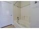 Clean bathroom with a bathtub and tiled walls at 2724 Via Murano # 631, Clearwater, FL 33764