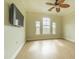 Spacious bedroom with wood floors and large windows at 2724 Via Murano # 631, Clearwater, FL 33764
