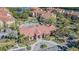 Community clubhouse with inviting entryway and landscaping at 2724 Via Murano # 631, Clearwater, FL 33764