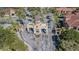 Community entrance with grand gate and manicured landscaping at 2724 Via Murano # 631, Clearwater, FL 33764