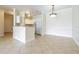 Bright kitchen with granite countertops and white cabinets at 2724 Via Murano # 631, Clearwater, FL 33764