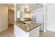 Kitchen with granite countertops and white cabinets at 2724 Via Murano # 631, Clearwater, FL 33764