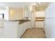 Kitchen with granite countertops and white cabinets at 2724 Via Murano # 631, Clearwater, FL 33764