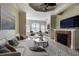 Spacious living room with fireplace and ample natural light at 2724 Via Murano # 631, Clearwater, FL 33764