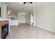 Open living area with fireplace and kitchen views at 2724 Via Murano # 631, Clearwater, FL 33764