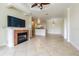 Open living room with fireplace and kitchen views at 2724 Via Murano # 631, Clearwater, FL 33764