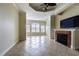 Spacious living room with fireplace and tile floors at 2724 Via Murano # 631, Clearwater, FL 33764