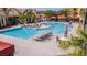 Resort-style pool area with multiple lounging areas at 2724 Via Murano # 631, Clearwater, FL 33764