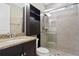 Bathroom boasts granite vanity and a large walk-in shower at 28475 Marsciano Ln, Wesley Chapel, FL 33543