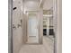 Spa-like bathroom with a large shower and a built-in bench at 28475 Marsciano Ln, Wesley Chapel, FL 33543
