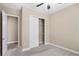 Spacious bedroom with plush carpeting and ample closet space at 28475 Marsciano Ln, Wesley Chapel, FL 33543