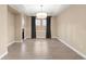 Spacious dining room featuring tile flooring and neutral color palette at 28475 Marsciano Ln, Wesley Chapel, FL 33543