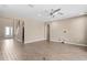 Bright living room with hardwood floors and neutral tones at 28475 Marsciano Ln, Wesley Chapel, FL 33543