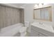Updated bathroom with new vanity, tile, and flooring at 2866 Countrybrook Dr # 15, Palm Harbor, FL 34684
