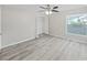 Spacious bedroom with large closet and wood-look floors at 2866 Countrybrook Dr # 15, Palm Harbor, FL 34684