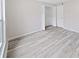 Spacious bedroom with large closet and wood-look floors at 2866 Countrybrook Dr # 15, Palm Harbor, FL 34684