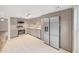 Modern kitchen with stainless steel appliances and light gray cabinets at 2866 Countrybrook Dr # 15, Palm Harbor, FL 34684