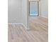 Open concept living area with wood-look floors at 2866 Countrybrook Dr # 15, Palm Harbor, FL 34684
