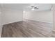 Spacious living room with wood-look floors at 2866 Countrybrook Dr # 15, Palm Harbor, FL 34684