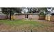 Large fenced backyard with grassy area at 301 3Rd Sw Ave, Largo, FL 33770