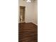 Bedroom with bathroom access and dark wood floors at 301 3Rd Sw Ave, Largo, FL 33770