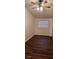 Bright bedroom with dark wood flooring and ceiling fan at 301 3Rd Sw Ave, Largo, FL 33770