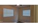 Bedroom with dark wood floors and two windows at 301 3Rd Sw Ave, Largo, FL 33770