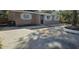 Newly renovated home with a gravel driveway at 301 3Rd Sw Ave, Largo, FL 33770