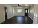 Spacious living area with dark hardwood floors at 301 3Rd Sw Ave, Largo, FL 33770