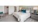 Main bedroom with carpeted floors and en-suite bathroom at 31548 Ancient Sage Rd, Wesley Chapel, FL 33545