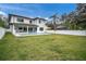 Large backyard with pool and spacious grassy area at 3213 W Fair Oaks Ave, Tampa, FL 33611